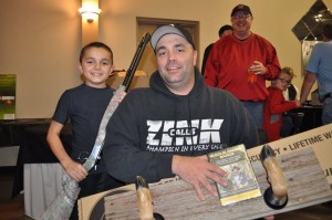 Silent Auction Bonus Winner, Dustin Thoms, Lincoln, NE - deer foot gun rack + CVA muzzleloader.